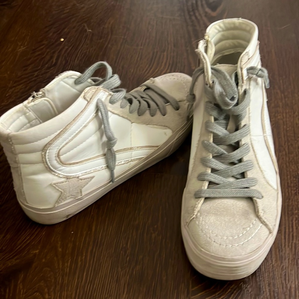 White high top sneakers in size 7.